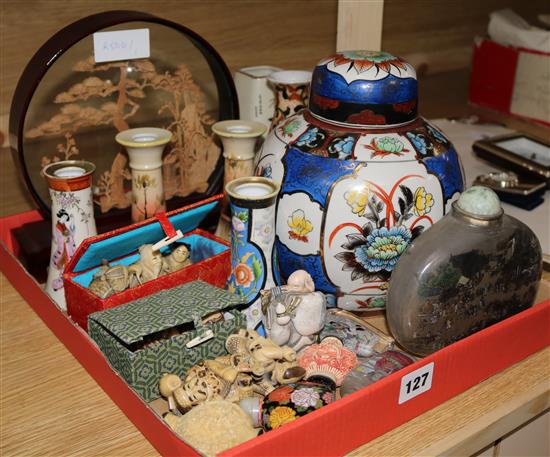 A collection of Oriental wares: candlesticks, figures, cork display & scent bottles